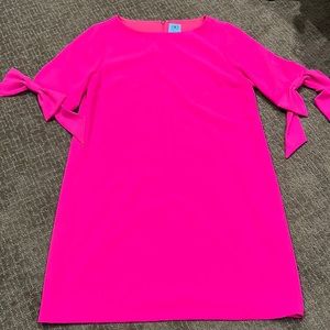 Beautiful hot pink party dress with bow details on sleeves. Only worn once.